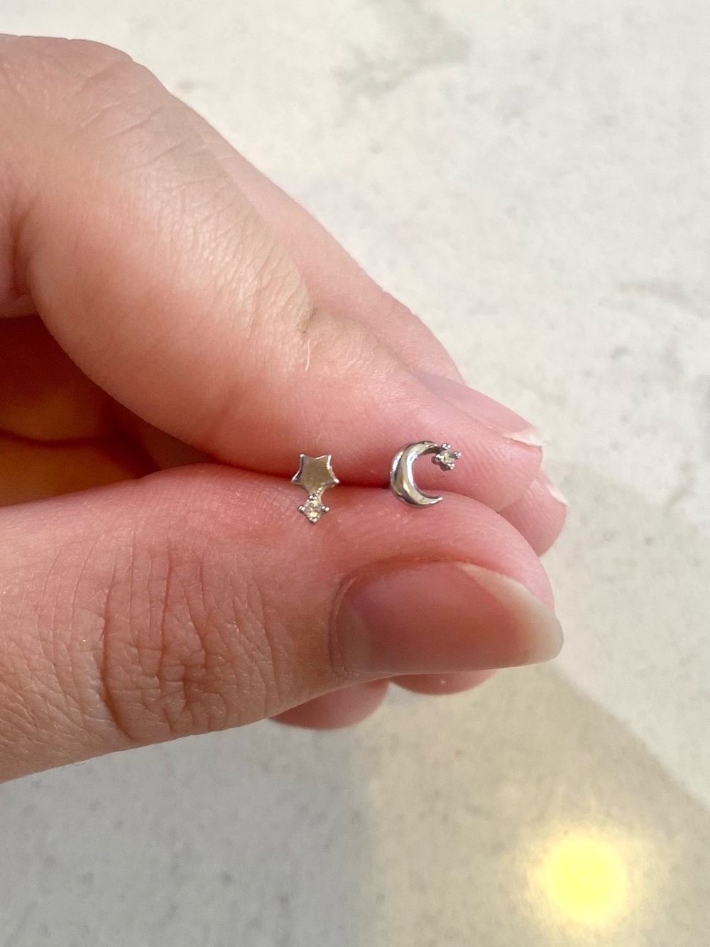 Handmade sterling silver celestial star and moon cubic zirconia stud earrings